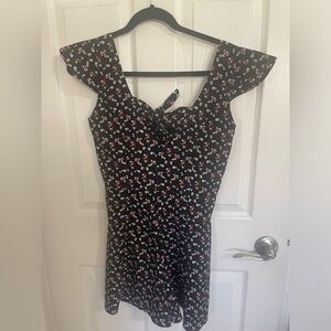 Black floral romper with cap sleeves size small